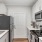 Galley Style Kitchen with stainless steel appliances 